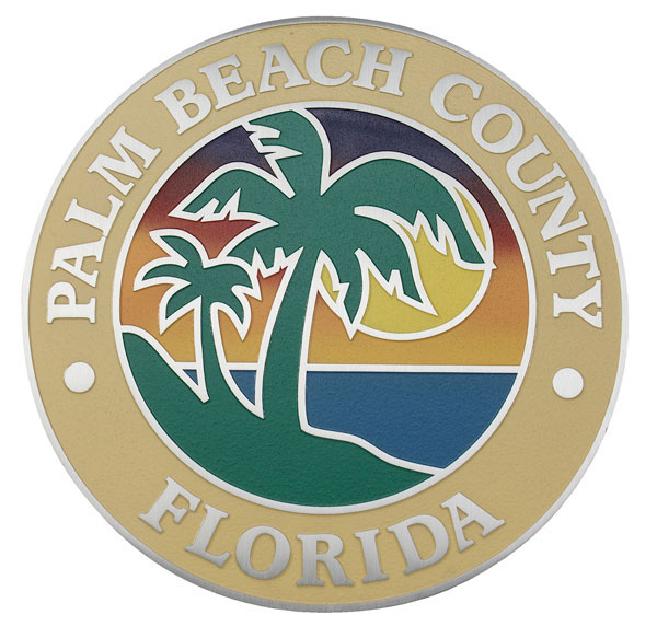 Round Logo with the words Palm Beach County Florida encircling a Palm Tree image